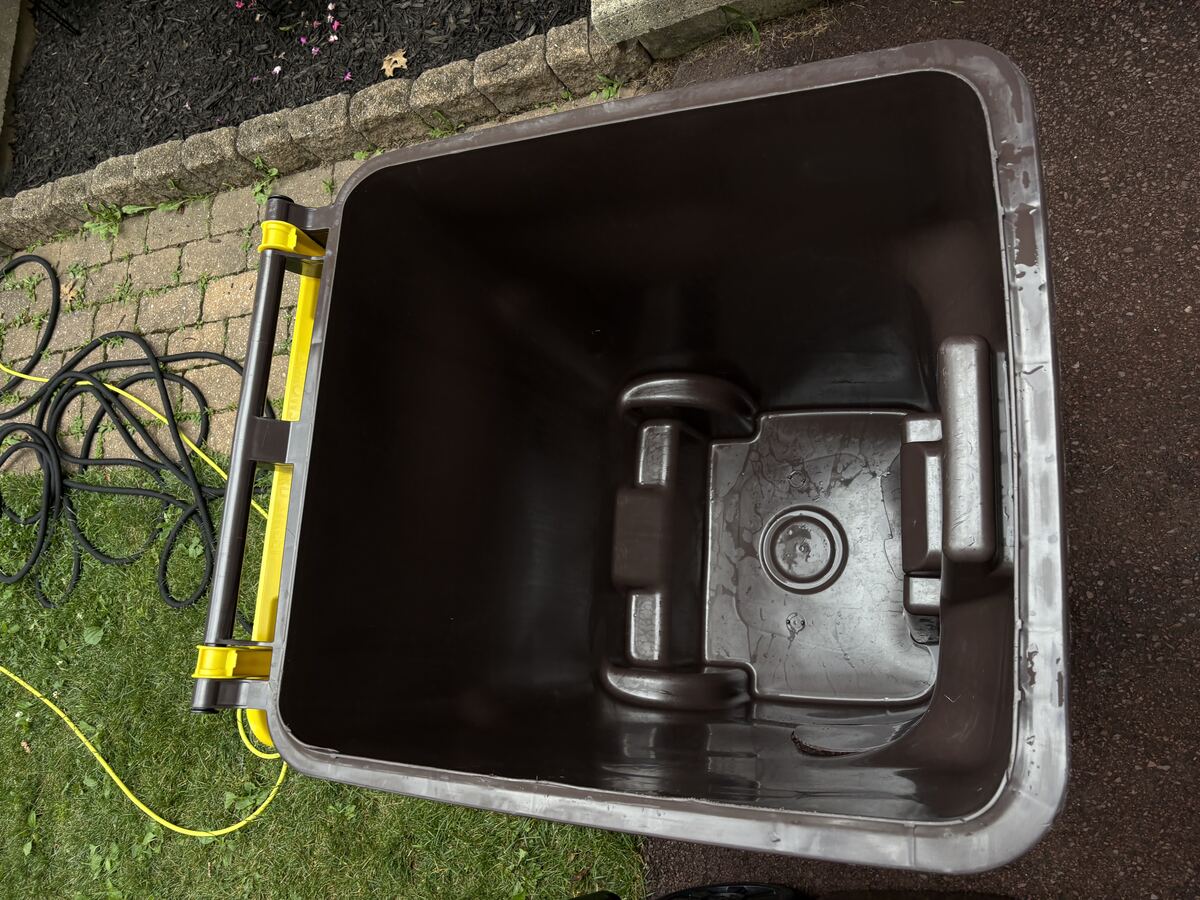 Clean trash bin interior after Bin Blasters power washing